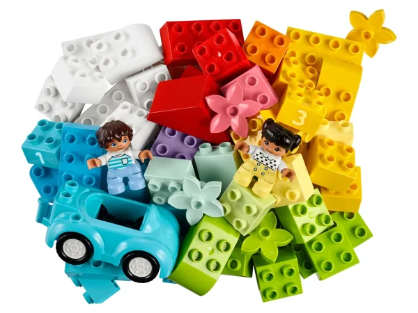 This fun-filled developmental toy is packed with bricks and pieces that encourage toddlers to explore hands-on creativity and imaginative play. Familiar objects stimulate young minds and colorful shapes invite free-building fun, making this LEGO® DUPLO® starter set the perfect way to inspire any young builder. Educational toy for toddlers! Inside the sturdy storage box, you'll find a car with moving wheels, a roof, window, flowers, bread, DUPLO people figures, 1,2,3 numbered bricks… along with an assortment of original bricks in a rainbow of inviting colors. As parents share the joy of combining the bricks and pieces into endless imaginative play possibilities, they experience first-hand their little builder’s precious developmental milestones. Great gifts for preschoolers! DUPLO playsets put open-ended play and self-expression into the hands of budding builders. With colorful, easy-to-hold pieces that excite toddlers' imaginations, they're safe, clean and easy to take wherever you go. As they create and play with the toddler-friendly mix of LEGO® DUPLO® bricks and pieces, your little builder will develop creative thinking and problem-solving abilities, visual-spatial awareness and fine motor skills. Includes 65 colorful bricks plus familiar pieces to stimulate toddlers' minds, including a car with moving wheels, a roof, window, flowers, bread, DUPLO® people figures and 1-2-3 number-learning bricks. As parents and carers join in the fun of combining the bricks and pieces to create endless imaginative toys and play possibilities, they experience their little builder’s precious developmental milestones. With safe, colorful, easy-to-handle bricks and pieces, this educational toy for toddlers makes a great Christmas, birthday or any-other-day gift for boys and girls aged 18 months and up. All the captivating colors, shapes, objects, people and numbers are conveniently stored in an attractive LEGO® DUPLO® box. Combine them with other DUPLO sets for even more imaginative fun. This building toy is powered by kids’ imaginations – no batteries needed! Hands-on, battery-free toys boost kids’ fine motor and problem-solving skills, and it puts creative control right in their hands. Open the storage box and the imaginative play starts right away! A simple guide provides parents and toddlers with inspiration – and, once kids start building, the imaginative pay will never stop! LEGO® DUPLO® playsets make great gifts for preschoolers. They fuel kids' imaginations, encouraging open-ended play and delivering developmental benefits to toddlers. LEGO® DUPLO® starter sets meet the highest industry standards, ensuring they are easy for little hands to pick up, place and pull apart – and it’s been that way since 1969! At The LEGO Group, we drop, squash, twist, heat, bite, bend, scratch and stretch LEGO® DUPLO® bricks and pieces to ensure every DUPLO building toy meets the highest global safety and quality standards.