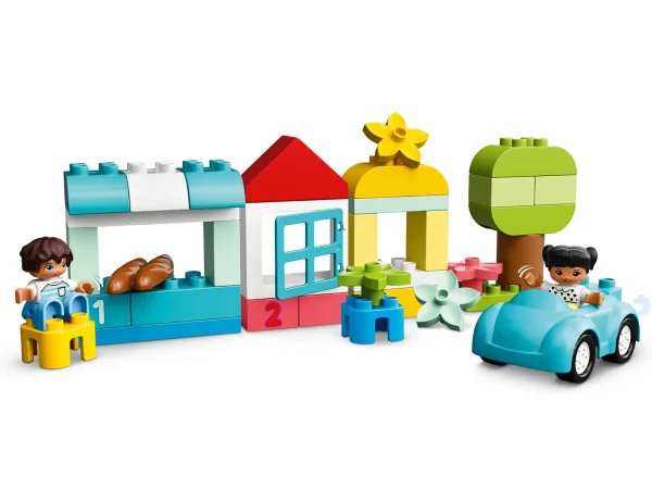 This fun-filled developmental toy is packed with bricks and pieces that encourage toddlers to explore hands-on creativity and imaginative play. Familiar objects stimulate young minds and colorful shapes invite free-building fun, making this LEGO® DUPLO® starter set the perfect way to inspire any young builder. Educational toy for toddlers! Inside the sturdy storage box, you'll find a car with moving wheels, a roof, window, flowers, bread, DUPLO people figures, 1,2,3 numbered bricks… along with an assortment of original bricks in a rainbow of inviting colors. As parents share the joy of combining the bricks and pieces into endless imaginative play possibilities, they experience first-hand their little builder’s precious developmental milestones. Great gifts for preschoolers! DUPLO playsets put open-ended play and self-expression into the hands of budding builders. With colorful, easy-to-hold pieces that excite toddlers' imaginations, they're safe, clean and easy to take wherever you go. As they create and play with the toddler-friendly mix of LEGO® DUPLO® bricks and pieces, your little builder will develop creative thinking and problem-solving abilities, visual-spatial awareness and fine motor skills. Includes 65 colorful bricks plus familiar pieces to stimulate toddlers' minds, including a car with moving wheels, a roof, window, flowers, bread, DUPLO® people figures and 1-2-3 number-learning bricks. As parents and carers join in the fun of combining the bricks and pieces to create endless imaginative toys and play possibilities, they experience their little builder’s precious developmental milestones. With safe, colorful, easy-to-handle bricks and pieces, this educational toy for toddlers makes a great Christmas, birthday or any-other-day gift for boys and girls aged 18 months and up. All the captivating colors, shapes, objects, people and numbers are conveniently stored in an attractive LEGO® DUPLO® box. Combine them with other DUPLO sets for even more imaginative fun. This building toy is powered by kids’ imaginations – no batteries needed! Hands-on, battery-free toys boost kids’ fine motor and problem-solving skills, and it puts creative control right in their hands. Open the storage box and the imaginative play starts right away! A simple guide provides parents and toddlers with inspiration – and, once kids start building, the imaginative pay will never stop! LEGO® DUPLO® playsets make great gifts for preschoolers. They fuel kids' imaginations, encouraging open-ended play and delivering developmental benefits to toddlers. LEGO® DUPLO® starter sets meet the highest industry standards, ensuring they are easy for little hands to pick up, place and pull apart – and it’s been that way since 1969! At The LEGO Group, we drop, squash, twist, heat, bite, bend, scratch and stretch LEGO® DUPLO® bricks and pieces to ensure every DUPLO building toy meets the highest global safety and quality standards.