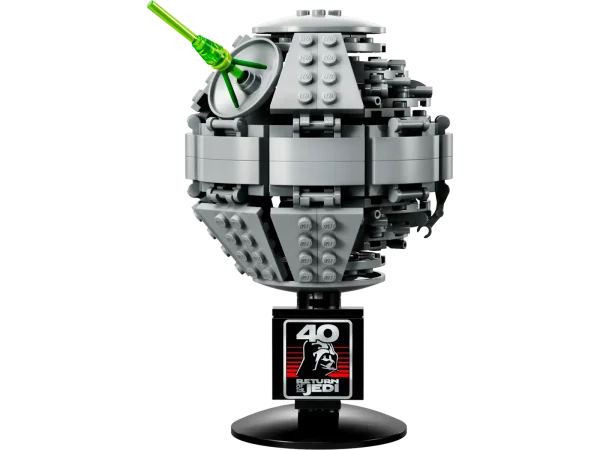 Bring back memories of dramatic Star Wars: Return of the Jedi moments with this miniature Death Star II™ build-and-display model (40591). It features a miniature recreation of the throne room inside to delight fans, a display stand that allows you to rotate the Death Star and view it from all angles, plus a Star Wars: Return of the Jedi 40th anniversary plaque. This gift-with-purchase makes a cool addition to any LEGO® Star Wars™ fan's collection. Brick-built model of the Death Star II (40591) – Trigger memories of epic Star Wars: Return of the Jedi scenes with this small, rotating LEGO® Star Wars™ replica of the Death Star II Build and display – This 289-piece LEGO® Star Wars™ building set for adults features a miniature throne room inside and a display stand with a Star Wars: Return of the Jedi 40th anniversary plaque Gift-with-purchase for fans – This collectible, brick-built LEGO® Star Wars™ model measures over 6 in. (15 cm) high and 3.5 in. (9 cm) in diameter