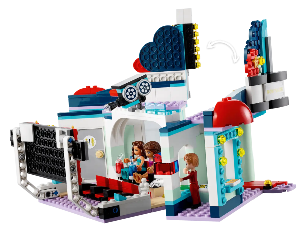 Treat kids to a red-carpet play experience as they imagine attending a movie premier at the LEGO® Friends Heartlake City Movie Theater (41448). This gift for kids features an art deco-style cinema packed with authentic details, such as a VIP area, popcorn kiosk and slushy cups. It comes complete with a starlet, ready to sign autographs for adoring fans. Everything in a toy a kid needs to transport them to a glamorous night at the movies. In the director's chair The model is hinged so kids can open it out to reveal a VIP screening room with exclusive seats for 5 of their most fabulous friends. The characters can ‘view’ the film on the screen, but this also flips to accommodate a cell phone, so kids can play director by showing their very own movies. Realistic role-play adventures LEGO Heartlake City birthday gifts for kids come packed with real-world details and relatable characters. They encourage kids to conjure up a creative world of role-play fun, alone or with their friends and family. Dazzle a movie-mad youngster with LEGO® Friends Heartlake City Movie Theater (41448). It’s premier night at this vintage-style cinema, with a red carpet and a glamorous LEGO Friends movie star! This hinged toy playset features a ticket desk and red-carpet area on one side and opens out to form a screening room, restroom and popcorn kiosk. Includes LEGO® Friends Andrea and 2 other mini-dolls. Kids can role-play superfan Andrea or movie star Amelia, or they can pretend to sell tickets andpopcorn. Movie-mad kids can imagine they’re a VIP watching the premier or operate the toy projector. The Heartlake City cinema lets kids screen their own movie creations for the mini-dolls by resting a cell phone against the screen, which also flips to support a tablet. As with all LEGO® Friends sets, this model is packed with cool accessories to make the action come alive – this set includes tickets, paper and pen, popcorn, slushy cups and cash bills. Put a smile on the face of movie-mad kids aged 7+ with a birthday, Christmas or special-occasion gift of this interactive Heartlake City movie theater toy. Measuring over 6.5 in. (17 cm) high, 10 in. (27 cm) wide and 7 in. (19 cm) deep, this kids’ movie toy makes a head-turning centerpiece that will take pride of place in any bedroom. LEGO® Friends toys come with relatable characters and are packed with adorable toy accessories to set imaginations soaring. All new LEGO® Friends sets meet stringent industry standards toensure they are compatible, and connect and pull apart consistently every time – it’s been that way since 1958. Popular LEGO® toys are tested to the max to make sure they meet stringent global safety and quality standards.