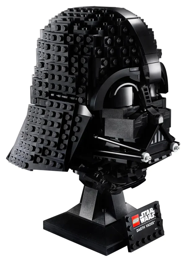 Pay homage to the Dark Lord of the Sith with this collectible LEGO® Star Wars™ Darth Vader Helmet (75304). Immerse yourself in the complex building process and relive classic Star Wars saga scenes as you recreate the iconic shape and sinister details of the helmet in LEGO style. Designed for display The Darth Vader Helmet is a compact size and has a display stand with a nameplate to complete a striking centerpiece that will enhance the decor of your home or workplace. And check out the other new-for-May-2021 LEGO Star Wars build-to-display helmet: Scout Trooper Helmet (75305). Special gift idea Part of a collection of LEGO Star Wars building kits for adults, this premium-quality set makes a wonderful memorabilia gift for yourself, any Star Wars fan, experienced LEGO builders or someone who enjoys a fun, creative challenge. Escape the stresses of everyday life for a while and enjoy some quality time recreating every menacing detail of Darth Vader’s Helmet with this collectible LEGO® Star Wars™ building kit (75304). The iconic design of Darth Vader’s Helmet is recreated in LEGO® bricks to spark memories of classic Star Wars™ saga scenes, and the display stand with nameplate completes an impressive centerpiece. This set is part of a series of collectible LEGO® Star Wars™ build-to-display helmet models – look out for the new-for-May-2021 Scout Trooper Helmet (75305). This 834-piece set offers a complex, rewarding building experience and makes a top birthday, holiday or surprise gift for any Star Wars™ enthusiast, experienced LEGO® builder or hobbyist. Measuring over 8 in. (20 cm) high, 5.5 in. (15 cm) wide and 5.5 in. (14cm) deep, this buildable Darth Vader Helmet model doesn’t need much space for display but makes a big visual impact. Buying this set for a huge Star Wars™ fan who is a LEGO® newcomer? No problem. It comes with easy-to-follow instructions so they can take on this complex build with the confidence of a Jedi Knight. This LEGO® Star Wars™ set for adults is part of a collection of premium-quality and fun building kits designed for you, the discerning hobbyist, who enjoys hands-on creative projects. Since 1958, LEGO® components have met rigorous industry standards to ensure consistent, secure connections and robust builds. LEGO® bricks and pieces are tested to the max to make sure they meet some of the most stringent safety standards on planet Earth – and in galaxies far, far away!