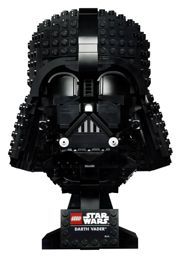 Pay homage to the Dark Lord of the Sith with this collectible LEGO® Star Wars™ Darth Vader Helmet (75304). Immerse yourself in the complex building process and relive classic Star Wars saga scenes as you recreate the iconic shape and sinister details of the helmet in LEGO style. Designed for display The Darth Vader Helmet is a compact size and has a display stand with a nameplate to complete a striking centerpiece that will enhance the decor of your home or workplace. And check out the other new-for-May-2021 LEGO Star Wars build-to-display helmet: Scout Trooper Helmet (75305). Special gift idea Part of a collection of LEGO Star Wars building kits for adults, this premium-quality set makes a wonderful memorabilia gift for yourself, any Star Wars fan, experienced LEGO builders or someone who enjoys a fun, creative challenge. Escape the stresses of everyday life for a while and enjoy some quality time recreating every menacing detail of Darth Vader’s Helmet with this collectible LEGO® Star Wars™ building kit (75304). The iconic design of Darth Vader’s Helmet is recreated in LEGO® bricks to spark memories of classic Star Wars™ saga scenes, and the display stand with nameplate completes an impressive centerpiece. This set is part of a series of collectible LEGO® Star Wars™ build-to-display helmet models – look out for the new-for-May-2021 Scout Trooper Helmet (75305). This 834-piece set offers a complex, rewarding building experience and makes a top birthday, holiday or surprise gift for any Star Wars™ enthusiast, experienced LEGO® builder or hobbyist. Measuring over 8 in. (20 cm) high, 5.5 in. (15 cm) wide and 5.5 in. (14cm) deep, this buildable Darth Vader Helmet model doesn’t need much space for display but makes a big visual impact. Buying this set for a huge Star Wars™ fan who is a LEGO® newcomer? No problem. It comes with easy-to-follow instructions so they can take on this complex build with the confidence of a Jedi Knight. This LEGO® Star Wars™ set for adults is part of a collection of premium-quality and fun building kits designed for you, the discerning hobbyist, who enjoys hands-on creative projects. Since 1958, LEGO® components have met rigorous industry standards to ensure consistent, secure connections and robust builds. LEGO® bricks and pieces are tested to the max to make sure they meet some of the most stringent safety standards on planet Earth – and in galaxies far, far away!