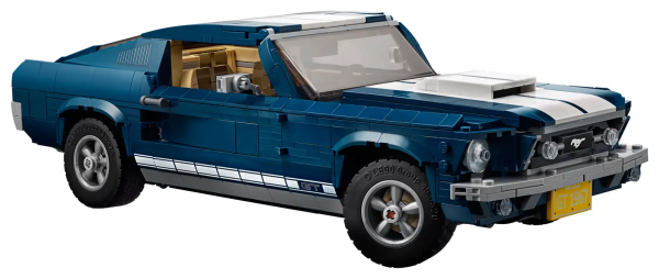 Discover the magic of an iconic 1960s American muscle car with the LEGO® Creator Ford Mustang, featuring dark-blue bodywork with white racing stripes, bonnet scoop, printed mustang grille badge, GT emblems and 5-spoke rims with road-gripping tires. Developed with input from Ford, this authentic replica comes with optional add-ons for customization, including a selection of license plates, supercharger, rear ducktail spoiler, beefy exhaust pipes, front chin spoiler and a nitrous oxide tank. You can even adjust the lift of the rear axle for an extra-mean look! Remove the roof panel or open the doors and you have access to the detailed interior with handsome seats, radio, working steering and a mid-console gearshift. Store items in the trunk or lift the hood to reveal a detailed big block 390 V8 engine with battery, hoses and air filter detailing. This advanced building set has been designed to provide a challenging and rewarding building experience full of nostalgia and makes a great centerpiece for the home or office. Authentic replica of a 1960s Ford Mustang featuring dark-blue bodywork with white racing stripes, air scoop, 5-spoke rims with road-gripping tires, and a selection customization add-ons. Open the doors or remove the roof panel to access the detailed interior with handsome seats, radio, mid-console gearshift and working steering. Open the trunk to store items and lift the hood to reveal a detailed Ford Mustang V8 engine with battery, hoses and air filter. Also includes a printed mustang grille badge and 2 GT emblems. Customize the Ford Mustang with the included supercharger, rear ducktail spoiler, beefy exhaust pipes, front chin spoiler and a nitrous oxide tank. Choose from a selection of license plates. Lift the hood to check out the realistic engine detailing. Adjust the lift of the rear axle for a real mean look! New-for-March-2019 special elements include 5-spoke rims, 2x8 brick with bow, 1x3 mustang logo tile, 2x4 bow with ‘GT’ Emblem. Measures over 3” (10cm) high, 13” (34cm) long and 5” (14cm) wide.