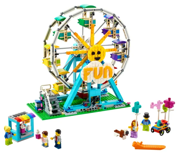 Kids can enjoy a fun-filled day out at the fairground with this brilliantly detailed LEGO® Creator 3in1 Ferris Wheel (31119). This toy construction set features a rotating Ferris Wheel with 8 gondolas, a ticket booth, a balloon cart with balloon animals, 5 minifigures and a brick-built dog. Awesome toys fuel kids’ passions The fun never stops as kids can build 3 different fairground rides with this supercool LEGO Creator 3in1 set. They can assemble the Ferris Wheel, rebuild it into a bumper car playset, transform it into a swing boat ride, or use the bricks to create something completely new. Cool toys for creative play LEGO Creator 3in1 sets let kids explore their creative side with 3 models to build in every box! The play possibilities never end because each model can be rebuilt into something new as often as kids want. Choose from an amazing range of 3in1 sets, including cars, animals and space rockets. The LEGO® Creator 3in1 Ferris Wheel (31119) amusement park toy set jump-starts kids’ creativity with 3 models in 1 – a Ferris Wheel, bumper car ride and swing boat ride. This LEGO® set includes 5 minifigures – mom, dad, kid, and 2 fairground workers to further enhance youngsters’ exciting days out at the amusement park. The rotating Ferris Wheel features 8 gondolas for the minifigures to ride inside, a ticket booth, a balloon cart with balloon animals and a brick-built dog. The bumper car ride features 3 cars and a ticket booth with an announcer microphone, while the swing boat ride comes with a claw machine and a gumball machine. This 1,002-piece LEGO® Creator 3in1 toy set offers a wonderful bonding experience when kids aged 9 and up assemble it with a parent or caregiver. Standing over 10.5 in. (27 cm) high, 6 in. (16 cm) deep and 10.5 in. (26 cm) wide, the Ferris Wheel is guaranteed to impress when on display in a kid’s bedroom in between playtimes. Look out for othergreat new-for-2021 LEGO® Creator 3in1 sets including Space Shuttle Adventure (31117) and Medieval Castle (31120). LEGO® Creator 3in1 sets let kids enjoy amazing role play as they plot fast-moving stories around the 3 different models in every box. Since 1958 LEGO® building bricks have been made from high-quality materials to ensure they consistently connect and pull apart every time. LEGO® building bricks meet stringent global safety standards.