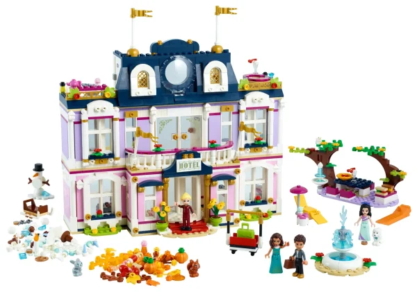 Looking for a glamorous gift to impress a creative kid? The Heartlake City Grand Hotel (41684) toy will surprise and delight from the moment they step through its revolving door. This beautiful 3-story set is filled with creative details to keep little builders entertained with hours of real-world play. Five-star features There’s lots to explore, from the piano bar and reception, to the en suite bedrooms and outdoor dining area, as well as ritzy features such as a spa and penthouse. The setalso comes with mini-doll actress toy Amelia so kids can pretend play the A-list lifestyle. LEGO® Friends Stephanie, Emma and River are included to play the parts of the guests, receptionist or bellhop. A set for all seasons Included seasonal accessories give an added dimension to the play. As the seasons change, kids can dress their model in creative kit, keeping the play fresh. The trees’ leaves can change color in fall, there are snowballs, icicles and a snowman for winter, plus flowers for summer. Let kids play out an A-list lifestyle at the Heartlake City Grand Hotel (41684), a feature-packed, 3-story, Parisian-style building toy, complete with seasonal accessories for year-long fun. Comes with 4 LEGO® Friends mini-dolls – including actress and receptionist figures – and 3 animal figures. Packed with authentic details, the hotel has 5 rooms to explore, plus an outdoor dining area. Creative kids will have hours of fun recreating what it’s like to stay or work in a ritzy hotel. They’ll love using their imagination to dress the hotel toy in accessories depending on the seasons. Ideal seasonal gift for boys and girls aged 8+ who love real-world toys. Makes a show-stopping present for kids with a little building experience who will enjoy the construction challenge. Main building measures over 11 in. (28cm) high, 11 in. (28 cm) wide and 5 in. (14 cm) deep. Thanks to its size and styling, this LEGO® Friends set makes a centerpiece display with real impact. Like allLEGO® Friends sets, this 1,308-piece model is packed with authentic accessories to help spark truly creative play. There’s even a bellhop’s luggage cart and room keys that fit the doors! Seasonal creative kit keeps the play fresh all year long. In winter there are candle lights and snowballs; summer brings flowers and ice cream; and there are golden leaves and pumpkins for fall. Introduce youngsters to the world of Heartlake City toys. They’ll find cool vehicles, realistic buildings and everyday heroes – perfect for kids who love to role-play the real world. New LEGO® toys meet rigorous industry standards, which ensures they are consistent and compatible – it’s been that way since 1958. LEGO® Friends Heartlake City kids’ toys are tested in almost every way imaginable so you can rest assured that each toy building set meets stringent safety standards.