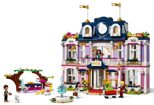 Looking for a glamorous gift to impress a creative kid? The Heartlake City Grand Hotel (41684) toy will surprise and delight from the moment they step through its revolving door. This beautiful 3-story set is filled with creative details to keep little builders entertained with hours of real-world play. Five-star features There’s lots to explore, from the piano bar and reception, to the en suite bedrooms and outdoor dining area, as well as ritzy features such as a spa and penthouse. The setalso comes with mini-doll actress toy Amelia so kids can pretend play the A-list lifestyle. LEGO® Friends Stephanie, Emma and River are included to play the parts of the guests, receptionist or bellhop. A set for all seasons Included seasonal accessories give an added dimension to the play. As the seasons change, kids can dress their model in creative kit, keeping the play fresh. The trees’ leaves can change color in fall, there are snowballs, icicles and a snowman for winter, plus flowers for summer. Let kids play out an A-list lifestyle at the Heartlake City Grand Hotel (41684), a feature-packed, 3-story, Parisian-style building toy, complete with seasonal accessories for year-long fun. Comes with 4 LEGO® Friends mini-dolls – including actress and receptionist figures – and 3 animal figures. Packed with authentic details, the hotel has 5 rooms to explore, plus an outdoor dining area. Creative kids will have hours of fun recreating what it’s like to stay or work in a ritzy hotel. They’ll love using their imagination to dress the hotel toy in accessories depending on the seasons. Ideal seasonal gift for boys and girls aged 8+ who love real-world toys. Makes a show-stopping present for kids with a little building experience who will enjoy the construction challenge. Main building measures over 11 in. (28cm) high, 11 in. (28 cm) wide and 5 in. (14 cm) deep. Thanks to its size and styling, this LEGO® Friends set makes a centerpiece display with real impact. Like allLEGO® Friends sets, this 1,308-piece model is packed with authentic accessories to help spark truly creative play. There’s even a bellhop’s luggage cart and room keys that fit the doors! Seasonal creative kit keeps the play fresh all year long. In winter there are candle lights and snowballs; summer brings flowers and ice cream; and there are golden leaves and pumpkins for fall. Introduce youngsters to the world of Heartlake City toys. They’ll find cool vehicles, realistic buildings and everyday heroes – perfect for kids who love to role-play the real world. New LEGO® toys meet rigorous industry standards, which ensures they are consistent and compatible – it’s been that way since 1958. LEGO® Friends Heartlake City kids’ toys are tested in almost every way imaginable so you can rest assured that each toy building set meets stringent safety standards.