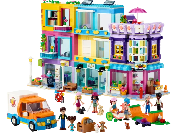 LEGO® Friends fans aged 8+ will love hanging out in the heart of the community with the LEGO® Friends Main Street Building (41704) set. It comprises 3 buildings that join to form a neighborhood block with apartments. There’s a hairdresser, an international food market and a book café. As each element is modular, creative kids will love configuring the buildings however they choose! It comes with 12 figures so imaginative role-play possibilities are endless. Playset with presence – Measuring over 9 in. (24 cm) high, 15 in. (39 cm) wide and 6 in. (16 cm) deep, this extensive set is a display piece with real presence This set is packed with creative accessories to spark imaginative storytelling LEGO® Friends gifts satisfy rigorous global safety standards