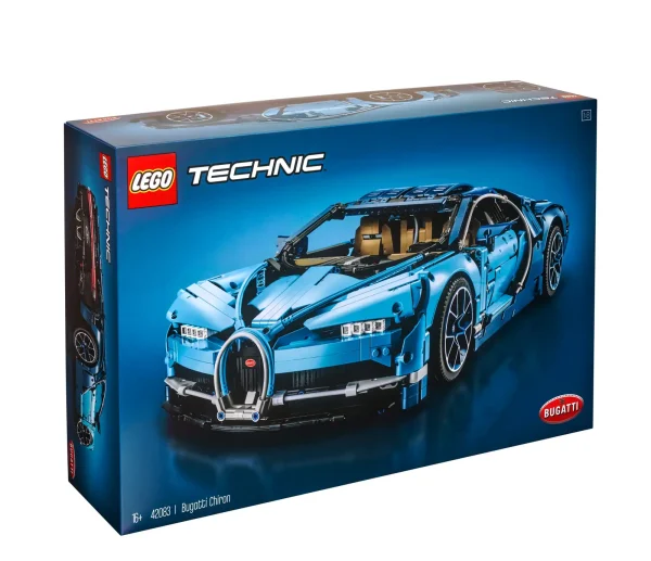 Explore engineering excellence with the LEGO® Technic™ 42083 Bugatti Chiron advanced building set. This exclusive model has been developed in partnership with Bugatti Automobiles S.A.S to capture the essence of the quintessential super sports car, and comes with gleaming aerodynamic bodywork, logoed spoked rims with low-profile tires, and detailed brake discs. The accessible cockpit features a Technic 8-speed gearbox with movable paddle gearshift and a steering wheel bearing the Bugatti emblem. Insert the top speed key and you can switch the active rear wing from handling to top speed position. The rear lid affords a glimpse of the detailed W16 engine with moving pistons, while beneath the hood you’ll discover a unique serial number and a compact storage compartment containing a stylish Bugatti overnight bag. This 1:8 scale model comes with a classic Bugatti duo-tone blue color scheme that reflects the brand's signature color, and a set of stickers for additional detailing. The set is delivered in luxurious box packaging and includes a color collector’s booklet with comprehensive building instructions. Exclusive 1:8 scale LEGO® Bugatti Chiron replica model with a wealth of luxurious features, including aerodynamic bodywork with an active rear wing, logoed spoked rims with low-profile tires, detailed brake discs and a W16 engine with moving pistons. Open the doors to access the detailed cockpit featuring a LEGO® Technic™ 8-speed gearbox with movable paddle gearshift and a steering wheel bearing the Bugatti emblem. Insert the top speed key to switch the active rear wing from handling to top speed position. Lift the hood to access a compact storage compartment containing a stylish Bugatti overnight bag. Check out the detailed W16 engine with moving pistons. Includes a unique serial number located beneath the hood. Comes with a classic Bugatti duo-tone blue color scheme that reflects the brand's signature color, plus a set of cool stickers for additional detailing. Delivered in luxurious box packaging. Includes a color collector's booklet with comprehensive building instructions. This LEGO® Technic™ model is designed to provide an immersive and rewarding building experience. This set includes 3,599 pieces. Suitable for ages 16+. Bugatti Chiron measures over 5” (14cm) high, 22” (56cm) long and 12.5”(32cm) wide.