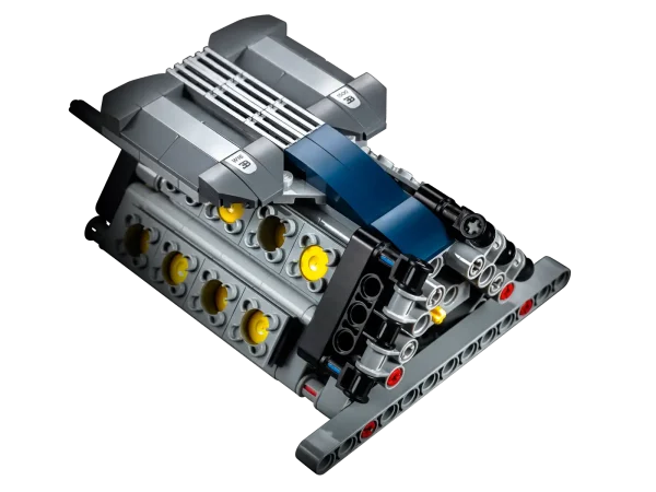 Explore engineering excellence with the LEGO® Technic™ 42083 Bugatti Chiron advanced building set. This exclusive model has been developed in partnership with Bugatti Automobiles S.A.S to capture the essence of the quintessential super sports car, and comes with gleaming aerodynamic bodywork, logoed spoked rims with low-profile tires, and detailed brake discs. The accessible cockpit features a Technic 8-speed gearbox with movable paddle gearshift and a steering wheel bearing the Bugatti emblem. Insert the top speed key and you can switch the active rear wing from handling to top speed position. The rear lid affords a glimpse of the detailed W16 engine with moving pistons, while beneath the hood you’ll discover a unique serial number and a compact storage compartment containing a stylish Bugatti overnight bag. This 1:8 scale model comes with a classic Bugatti duo-tone blue color scheme that reflects the brand's signature color, and a set of stickers for additional detailing. The set is delivered in luxurious box packaging and includes a color collector’s booklet with comprehensive building instructions. Exclusive 1:8 scale LEGO® Bugatti Chiron replica model with a wealth of luxurious features, including aerodynamic bodywork with an active rear wing, logoed spoked rims with low-profile tires, detailed brake discs and a W16 engine with moving pistons. Open the doors to access the detailed cockpit featuring a LEGO® Technic™ 8-speed gearbox with movable paddle gearshift and a steering wheel bearing the Bugatti emblem. Insert the top speed key to switch the active rear wing from handling to top speed position. Lift the hood to access a compact storage compartment containing a stylish Bugatti overnight bag. Check out the detailed W16 engine with moving pistons. Includes a unique serial number located beneath the hood. Comes with a classic Bugatti duo-tone blue color scheme that reflects the brand's signature color, plus a set of cool stickers for additional detailing. Delivered in luxurious box packaging. Includes a color collector's booklet with comprehensive building instructions. This LEGO® Technic™ model is designed to provide an immersive and rewarding building experience. This set includes 3,599 pieces. Suitable for ages 16+. Bugatti Chiron measures over 5” (14cm) high, 22” (56cm) long and 12.5”(32cm) wide.