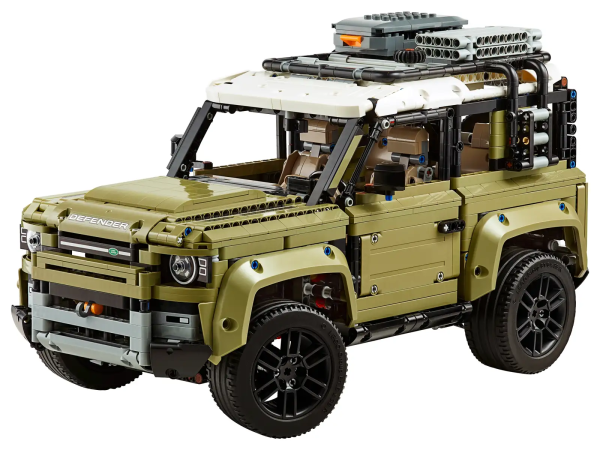 Experience world-leading vehicle design firsthand with this highly authentic and displayable 42110 LEGO® Technic™ Land Rover Defender model. Developed in partnership with Land Rover, this impressive LEGO replica captures the vehicle’s outstanding level of refinement with its clean, modern lines and sculpted surfaces, and comes with original-design rims with ground-gripping tires, plus a host of realistic features and functions. Opening doors allow access to an elaborate cabin with a working steering wheel, detailed dashboard and a new-for-October-2019 transmission system with 2 levers for engaging high or low gear ratios and a selector for changing gear – the most sophisticated LEGO Technic gearbox to date! The interior also features forward-folding rear seats that give visual access to the 4-speed sequential gearbox. And, the attention to detail doesn't end there. This awesome replica model also has an in-line 6-cylinder engine with moving pistons beneath the bonnet, working All Wheel Drive with 3 differentials, independent suspension on both axles and a working winch! You can even open the tail door with a turn of the rear-mounted spare wheel. Finished with a removable roof rack with storage box, pannier, ladder and traction mats, this impressive interpretation of the quintessential all-terrain vehicle has been designed to provide a truly immersive and rewarding building experience. The perfect gift for Land Rover enthusiasts and fans of classic collectible model cars. Features authentically designed bodywork with Land Rover emblems, original-design rims with ground-gripping tires, removable roof rack with storage box, pannier, ladder and traction mats, opening doors, bonnet and tail door, plus a detailed cabin. Functions include a 4-speed sequential gearbox, All Wheel Drive with 3 differentials, independent suspension on both axles, detailed in-line 6-cylinder engine and a working winch. Cabin features a detailed dashboard, working steering wheel and forward-folding rear seats that reveal the 4-speed sequential gearbox. New-for-October-2019 transmission system with 2 levers for engaging high or low gear ratios and a selector for changing gear – the most sophisticated LEGO® Technic™ gearbox to date! Check out the olive green, gray and black color scheme. Lift the bonnet to see the detailed in-line 6-cylinder engine with moving pistons. Open the doors to access the detailed cabin. Turn the rear-mounted spare wheel to open the tail door. Includes a collection of authentic stickers. This LEGO® Technic™ set is designed to provide an immersive and rewarding building experience. This set includes over 2,500 pieces. Land Rover Defender measures over 8” (22cm) high, 16” (42cm) long and 7” (20cm) wide