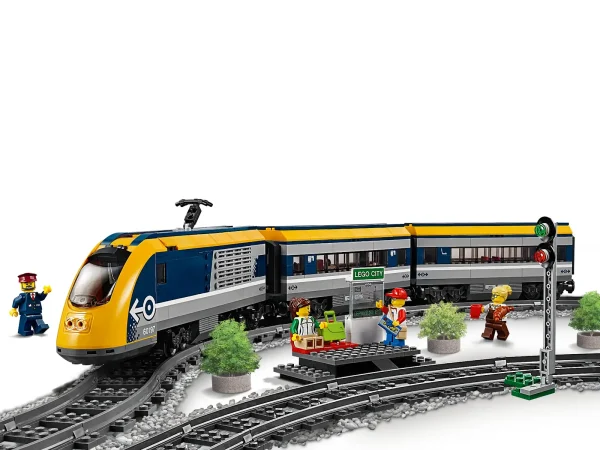 Climb aboard the LEGO® City 60197 Passenger Train! This fun set features a motorized engine with 10-speed Bluetooth remote control and opening nose cone, driver’s cabin with opening window, 2 cars with removable roofs, seats and tables, a full circular track with 16 curved and 4 straight rails, plus a buildable platform with 2 seats and train service map, train signal and 4 LEGO minifigures. Includes 4 LEGO® minifigures: 2 passengers, a train conductor and a train attendant. Features a motorized engine with 10-speed Bluetooth remote control and opening nose cone, pantograph on the roof and driver’s cabin with opening window and control panel, plus a café car with removable roof and tables, and a passenger car with removable roof, seats and tables. Also includes a platform with 2 seats and train services map, a full circular track with 16 curved rails and 4 straight rails, plus a buildable train signal pole. Accessory elements include 3 mugs, 3 muffins, a hot dog, croissant, messenger bag and a suitcase with LEGO® box inside. Lift off the roof to access the passenger train cabins filled with cool details. Operate the train with the 10-speed Bluetooth remote control. Drive to the platform and pick up or unload passengers. Set the rails in different ways to fit your city's style. This product requires batteries (not included). Please refer to the product packaging for types and quantities. The included Bluetooth remote is not compatible with older infrared remote-controlled LEGO® train sets. Passenger Train with cars measures over 4” (11cm) high, 27” (69cm) long and 1” (5cm) wide. Engine section measures over 4” (11cm) high, 10” (26cm) long and 1” (5cm) wide. Platform measures over 2” (7cm) high, 4” (11cm) wide and 2” (6cm) deep.