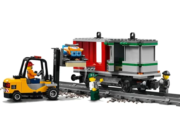 Load up the powerful LEGO® City 60198 Cargo Train and deliver the goods on time! This cool LEGO City set features a motorized engine with 10-speed Bluetooth remote control, accessible driver’s cabin, a crane wagon with rotating and extendable boom arm, container wagon with 2 containers, and a log wagon, plus an armored truck with opening doors, and a forklift with opening roll cage and lifting forks. This cool LEGO train set also includes a full circular track with 16 curved rails, 16 straight rails and a railroad switch with lever, plus a control center with ladder and 2 buildable pallets with money bills, gold bar elements, a snow scooter and 6 LEGO minifigures. Includes 6 LEGO® minifigures: 4 train workers, a security officer and a crook. Features a motorized engine with 10-speed Bluetooth remote control, pantograph on the opening roof, and driver’s cabin with control panel. Also features a log wagon, crane wagon with rotating and extendable boom arm, and a container wagon with 2 containers with hooks on the roof for loading and space for pallets. Includes a control center with ladder and signal lights, a full circular toy train track with 16 curved rails, 16 straight rails and a railroad switch with lever, a money transport truck with opening doors, and a working forklift with opening roll cage. Accessory elements include a wrench, 12 gold bar elements and 4 money bills, plus 2 buildable pallets, 3 logs and snow scooter. Open the roof to access the engine car filled with cool details. Operate the cargo train with the 10-speed Bluetooth remote control. Lift and load logs onto the log wagon with the crane's rotating arm and hook. Push the lever on the railroad switch to drive the train to a different track for loading or unloading. Load pallets into the containers with the forklift before lifting them onto the container wagon with the crane. Set up the tracks in different configurations to load or offload cargo around your city. This product requires batteries (not included). Please refer to the product packaging for type and quantities. The included Bluetooth remote is not compatible with older infrared remote-controlled LEGO® train sets. Cargo Train in total measures over 4” (11cm) high, 32” (82cm) long and 2” (6cm) wide. Engine measures over 4” (11cm) high, 10” (27cm) long and 2” (6cm) wide. Log wagon measures over 1” (5cm) high, 5” (15cm) long and 2” (6cm) wide. Crane wagon measures over 4” (10cm) high, 8” (22cm) long and 1” (5cm) wide. Container wagon measures over 3” (9cm) high, 7” (18cm) long and 1” (5cm) wide. Armored truck measure over 2” (6cm) high, 6” (15cm) long and 2” (6cm) wide. Control center measures over 8” (21cm) high, 3” (8cm) wide and 4” (12cm) deep. Forklift measures over 2” (7cm) high, 2” (5cm) wide and 4” (12cm) deep.