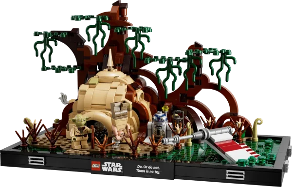 Focus, you must, to construct this LEGO® Star Wars™ Dagobah Jedi Training Diorama (75330). This brick-built display model is packed with instantly recognizable details from an iconic Star Wars: The Empire Strikes Back scene. Recreate Yoda’s hut in the swamps of Dagobah, and the wing of Luke Skywalker’s sunken X-wing. Add the LEGO minifigures of Yoda and Luke Skywalker, plus an R2-D2 LEGO droid figure (Luke and R2-D2 feature new-for-May-2022 decoration). To complete a nostalgic display piece, attach the plaque bearing Yoda’s words: “Do. Or do not. There is no try.” Step-by-step guide A great gift idea for fans of the classic Star Wars trilogy, the set includes clear building instructions so even LEGO newcomers can enjoy the fun, creative experience. Galaxy of joy It began a long time ago, in a galaxy far, far away. Now the saga continues in your own home with a collection of top-quality LEGO Star Wars sets for adults, including other buildable dioramas depicting memorable scenes. Detailed Dagobah Jedi Training Diorama (75330) – Channel the focus of Jedi Master Yoda as you recreate an iconic Star Wars: The Empire Strikes Back scene with LEGO® bricks 2 LEGO® Star Wars™ minifigures and a LEGO droid figure – Luke Skywalker and Yoda with his walking stick, plus R2-D2 to bring the buildable scene to life Made for display – Build Yoda’s hut on the planet Dagobah, plus the wing of Luke Skywalker’s X-wing sticking out of the swamp. Attach a plaque reading ‘Do. Or do not. There is no try’, as said by Yoda Build your collection – This set is part of a series of collectible LEGO® Star Wars™ build-to-display diorama models, each depicting a beloved Star Wars scene Gift idea – Treat yourself or give this 1,000-piece set as a holiday gift or birthday present to an adult Star Wars™ fan, passionate LEGO® builder or collector of LEGO Star Wars dioramas Brick-built Star Wars™ memorabilia designed to spark nostalgia – This diorama measures over 6 in. (16 cm) high, 11 in. (29 cm) wide and 6.5 in. (17 cm) deep Step-by-step guide – Are you a newcomer to LEGO® building sets? No problem. There are illustrated instructions in the box to help you build with the confidence of Jedi Master Yoda From a galaxy far, far away to your living room – LEGO® Star Wars™ sets for adults are designed for you, the discerning hobbyist who enjoys hands-on creative projects to relax and recharge Premium quality – Since 1958, LEGO® components have met rigorous industry standards to ensure they are consistent, compatible and connect securely Safety compliance – LEGO® bricks and pieces are dropped, heated, crushed, twisted and analyzed to make sure that they comply with strict global safety standards