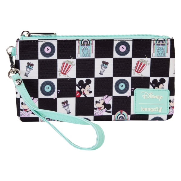 Select a song from the jukebox and prepare to dance! Our Loungefly Disney Mickey Mouse and Minnie Mouse Date Night Diner All-Over-Print Nylon Wristlet is ready for fun. This accessory features an all-over black-and-white checkered pattern, reminiscent of a dance floor in a 1950s diner. Inside the white checker boxes, you’ll find printed images of records, jukeboxes, Disney’s Mickey Mouse and Minnie Mouse, popcorn, and ice cream sundaes. Accents of teal add a retro pop of color. When you open the wallet, there are approximately four slots for holding cards and securing valuables. Bring your plus one, and this wallet, to kick up your heels in style. The Loungefly Disney Mickey Mouse and Minnie Mouse Date Night Diner All-Over-Print Nylon Wristlet is made of nylon. Wallet zips closed with silver-colored metal hardware. Additional features include printed details. Take note of the inside lining with the Loungefly logo. This wallet is an officially licensed Disney product. Wallet dimensions: 7”W x 4.5”H