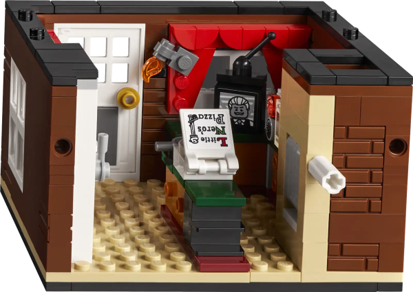 Relive a family-favorite Christmas comedy movie with this LEGO® Ideas Home Alone set (21330) for play and display. The McCallisters’ house is packed with instantly recognizable details and delightful features to recreate hilarious scenes. There is everything you need to stage Kevin’s fake Christmas party, a basement furnace with a LEGO light brick, iron-drop function, swinging paint cans, collapsible shelves, zip line from the attic to the tree house and more. Each level of the house is detachable, and the walls and roof open up for easy access. Top Christmas holiday gift The set includes 5 LEGO minifigures of Kevin McCallister, mom Kate McCallister, crooks Harry and Marv and neighbor ‘Old Man’ Marley, plus Harry and Marv’s van with crowbar and police hat elements inside. With 3,957 pieces, this is the biggest LEGO Ideas set so far and the bricks are divided into bags following the movie’s plotline, so you can relive the story as you build during the holidays. Celebrate a family-favorite Christmas comedy movie with this LEGO® Ideas Home Alone set (21330), featuring buildable models of the McCallisters’ house, tree house and crooks’ van for play and display. This brick-built movie memorabilia set makes a cool holiday gift for millennial Home Alone fans. It includes 5 LEGO® minifigures: Kevin McCallister, Kate McCallister, Harry, Marv and ‘Old Man’ Marley. The house’s walls and roof open up for easy access and it has many fun functions including swinging paint cans, a basement furnace that lights up and a lever to push Kevin down the stairs on his sled. Discover details that spark memories of hilarious movie moments in every room in the house and inside the van (not forgetting the zip line for Kevin to escape to the tree house!). Building this set is a fun holiday activity for the family, and the house, which measures over 10.5 in. (27 cm) high, 13 in. (34 cm) wide and 14.5 in. (37cm) deep, makes a super festive centerpiece. The bricks in this set are split into 24 bags and the building order follows the movie’s plotline. An LR41 battery is included for the LEGO® light brick that illuminates the furnace. This 3,957-piece set includes an illustrated booklet about Home Alone, the set’s fan creator and LEGO® designers, plus step-by-step instructions to guide your immersive, rewarding building experience. This collectible building kit for adults is one of many exciting LEGO® Ideas sets, each created by a fan designer, voted for by thousands of LEGO fans and produced by the LEGO Group. LEGO® components meet stringent industry quality standards so you can be sure that they connect simply and securely to create robust builds. It’s been that way since 1958. LEGO® building bricks and pieces are thoroughly tested to ensure that every LEGO set satisfies demanding global safety standards.