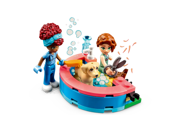 Little dog lovers aged 7 and up will have lots of fun creating their own pup-inspired tales with this LEGO® Friends Dog Rescue Center (41727) toy. The set includes everything kids need to care for the pooches who are waiting to be adopted. Animal lover Autumn knows her friend Zac adores dogs too, so she’s kindly invited him along. Kids will love helping the characters wash, groom and feed the dogs. There are also lots of areas for play, including an exercise area and a slide. The modular style lets kids rearrange the kennels and reception building to customize their own rescue center. Boost the fun Kids can enjoy an easy and intuitive building adventure with the LEGO Builder app. Here they can zoom in and rotate models in 3D, save sets and track their progress. Welcome to the next generation of Heartlake City Kids can make friends, discover exciting locations and act out real-life adventures in the LEGO Friends universe. Pet rescue toy for kids aged 7+ – Encourage kids to care for animals as they build and play with this fun LEGO® Friends Dog Rescue Center (41727) 3 mini-dolls, 3 dogs and accessories – The set comes with LEGO® Friends characters Autumn, Zac and Dr. Gabriela Silva, plus dog characters Pickle, Dash and Grace, and lots of pet accessories Customize the build – Kids can build their own dog rescue center by rearranging the different areas, which include a reception area, treatment room, grooming station, obstacle course and kennels Pet-care accessories – Kids will love using the accessories to create their own rescue center stories. The set comes with toys, scales, medicine, food, water, a magnifying glass, bed, brush and more A treat for little pet lovers – This LEGO® Friends toy set makes a fun birthday, holiday or any-other-day gift for kids aged 7 and up who would love to build their own animal rescue shelter Sized for young builders – The Dog Rescue Center measures over 7 in. (18 cm) high, 10.5 in. (26 cm) wide and 8 in. (20 cm) deep A helping hand – Discover intuitive building instructions in the LEGO® Builder app, where kids can zoom in and rotate models in 3D, track progress and save sets as they develop new skills A new generation of Heartlake City – In January 2023, the LEGO® Friends universe expanded to introduce new characters and new locations to inspire more role-play adventures A quality product – All LEGO® components meet strict industry standards to ensure they are consistent, compatible and easy to build with: it’s been that way since 1958 Safety first – LEGO® Friends bricks and pieces are dropped, heated, crushed, twisted and analyzed to make sure they meet stringent global safety standards