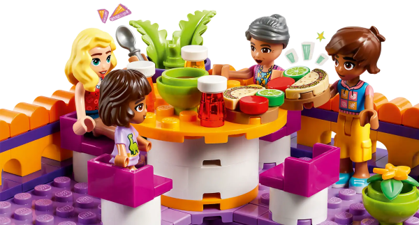 Little chefs aged 8+ can dream up delicious adventures at the LEGO® Friends Heartlake City Community Kitchen (41747). This building toy for kids shows the relationship between Leo, his sister Alba and their grandmother, who runs the kitchen. Leo loves to learn new cooking techniques and the set comes with lots of ingredients and accessories so kids can explore new things too. There’s a pantry, toy refrigerator, sink and a kitchen range with pans and a tortilla press. Outside, there’s seating and a roof terrace. This set combines with the LEGO Friends Heartlake City Community Center 41748 (sold separately) for even more community-based fun. Boost the fun Kids can enjoy an easy and intuitive building adventure with the LEGO Builder app. Here they can zoom in and rotate models in 3D, save sets and track their progress. Welcome to the next generation of Heartlake City Kids can make friends, discover exciting locations and act out real-life adventures in the LEGO Friends universe. Cooking play for kids aged 8+ – Kids who love getting creative in the kitchen can have fun building and playing with the LEGO® Friends Heartlake City Community Kitchen toy (41747) 5 characters and accessories – The set comes with LEGO® Friends characters Leo, Alba, Abuelita, Churro the cat and a customer called Matilde, plus lots of accessories for role play Toy kitchen accessories – Inspire imaginative play with accessories that include a variety of ingredients, a pantry, refrigerator and a sink. There’s also a kitchen range, utensils and outdoor seating Build the fun – This set can be added to the LEGO® Friends Heartlake City Community Center 41748 (sold separately) to create endless play opportunities inspired by community friendships A gift for kids – This building toy for kids makes an imaginative birthday, holiday, or anytime gift for kids who love cooking and kitchen role play Measurements – The community kitchen measures over 8 in. (22 cm) high, 8 in. (22 cm)wide and 6 in. (17 cm) deep A helping hand – Discover intuitive instructions in the LEGO® Builder app, where builders can zoom in and rotate models in 3D, track their progress and save sets as they develop new skills A new generation of Heartlake City – In January 2023, the LEGO® Friends universe expanded to introduce new characters and new locations to inspire more role-play adventures A quality product – All LEGO® components meet strict industry standards to ensure they are consistent, compatible and easy to build with: it’s been that way since 1958 Safety first – LEGO® Friends bricks and pieces are dropped, heated, crushed, twisted and analyzed to make sure they meet stringent global safety standards