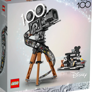 Showcase your passion for all things Disney with this eye-catching LEGO® ǀ Disney Walt Disney Tribute Camera (43230) set for adults. This detailed collectible set features a vintage-style movie ‘camera’ with a hinged back panel with a surprise and a film strip showing stills from 20 historic Disney movies, a director’s clapperboard with space for the 3 LEGO ǀ Disney minifigures, 2 LEGO animal figures and a multiplane camera with 3 printed screens showing how Disney’s The Old Mill short was made. The set also has a turning crank, sliding matte box and lenses that can be rotated on the old-fashioned movie camera, plus a movable lower stick on the clapperboard. Disney celebration tribute This premium LEGO ǀ Disney set, created to help celebrate Disney’s 100th anniversary, includes 2 well-known characters and 2 recognizable animals from iconic Disney movies, plus a LEGO ǀ Disney minifigure of Walt Disney, and can make a unique and distinctive collectible gift for display. Creative joy – Give any fan aged 18 and up who loves all things Disney a gift to inspire their imagination and fulfill their passion with this LEGO® ǀ Disney Walt Disney Tribute Camera (43230) set Build and display – This memorabilia-filled set has 811 pieces that create several distinct items, including an old-fashioned movie camera and director’s clapperboard with multiplane camera Iconic characters – Included in the set are 3 LEGO® ǀ Disney minifigures: Disney’s Mickey Mouse, Minnie Mouse and Walt Disney, plus Bambi and Dumbo LEGO animal figures Creative build – Any Disney or movie fan can enjoy this challenging build full of details. Make a unique display piece with the iconic movie camera, clapperboard, multiplane camera and characters Click-worthy display – The movie camera measures over 14.5 in. (37 cm) high, 8.5 in (21 cm) wide and 7 in. (19 cm) deep, making it, along with the other items, a display piece to reflect your passion Digital building guide – The LEGO® Builder app features a digital version of the building instructions included with this set Illustrated instructions – This distinctive set comes with a premium booklet filled with details about Disney, the camera, the set itself and instructions to guide you through the build process Uncompromising quality – Ever since 1958, LEGO® components have met stringent industry standards to ensure they connect consistently Safety first – LEGO® components are dropped, heated, crushed, twisted and analyzed to make sure they meet rigorous global safety standards