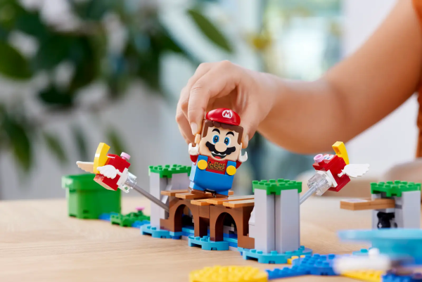Create an action-packed level with the LEGO® Super Mario™ Big Urchin Beach Ride Expansion Set (71400) for ages 7 and up. It features a roller coaster with a Dolphin LEGO figure for LEGO® Mario™ or LEGO® Luigi™ (figures not included) to ride on while trying to shake the Super Star Block out of the palm tree and topple a Big Urchin. Make Cheep Cheeps ‘leap’ by jumping on the bridge and collect more digital coins for spectacular dives off the springboard and fun interactions with the Yellow Yoshi toy figure. (Note: the 71360 or 71387 Starter Course is required for interactive play.) Sociable fun This toy playset makes an ace gift for trendsetting kids and is great for solo or social play. Get building instructions, creative tips and more on the companion LEGO Super Mario app. Unlimited play LEGO Super Mario Starter Courses and Expansion Sets, plus Power-Up Packs, allow fans to expand, rebuild and create their own unique levels for hours of exciting, coin-collecting play. Action-packed, buildable beach level – Take the LEGO® Super Mario™ action to the beach with the Big Urchin Beach Ride Expansion Set (71400) for solo or social play 5 LEGO® Super Mario™ toy figures – Yellow Yoshi, a Big Urchin, 2 Cheep Cheeps, and a Dolphin for LEGO® Mario™ or LEGO® Luigi™ (figures not included) to ride on High-diving, dolphin-riding fun – A springboard to perform dives and a roller coaster to shake the Super Star Block out of the palm tree and topple the Big Urchin Bridge with ‘leaping’ Cheep Cheeps – Jump up and down on the bridge to make the Cheep Cheeps ‘leap’ and stomp on them to collect digital coins Toy building set for ages 7 and up – Give this 536-piece set as a holiday gift or treat to trendsetting kids who own a LEGO® Super Mario™ Starter Course (71360 or 71387), which is needed for play Rebuild and combine – Measuring over 4.5 in. (12 cm) high, 19.5 in. (49 cm) wide and 18.5 in. (47 cm) deep in its basic formation, this module is designed to combine with other LEGO® Super Mario™ sets Digital instructions – Check out the LEGO® Super Mario™ app for building instructions, creative inspiration and more. For a list of compatible Android and iOS devices, visit LEGO.com/devicecheck Maximum creativity, no limits – Collectible LEGO® Super Mario™ toys bring iconic Super Mario™ characters into the real world and offer limitless creative challenges through expansion and rebuilding Quality assured – Since 1958, LEGO® building bricks and pieces have met stringent quality standards, ensuring that they connect simply and securely Safety first – LEGO® components are thoroughly tested to make sure that they comply with strict global safety standards