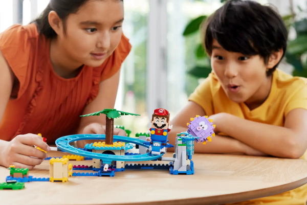 Create an action-packed level with the LEGO® Super Mario™ Big Urchin Beach Ride Expansion Set (71400) for ages 7 and up. It features a roller coaster with a Dolphin LEGO figure for LEGO® Mario™ or LEGO® Luigi™ (figures not included) to ride on while trying to shake the Super Star Block out of the palm tree and topple a Big Urchin. Make Cheep Cheeps ‘leap’ by jumping on the bridge and collect more digital coins for spectacular dives off the springboard and fun interactions with the Yellow Yoshi toy figure. (Note: the 71360 or 71387 Starter Course is required for interactive play.) Sociable fun This toy playset makes an ace gift for trendsetting kids and is great for solo or social play. Get building instructions, creative tips and more on the companion LEGO Super Mario app. Unlimited play LEGO Super Mario Starter Courses and Expansion Sets, plus Power-Up Packs, allow fans to expand, rebuild and create their own unique levels for hours of exciting, coin-collecting play. Action-packed, buildable beach level – Take the LEGO® Super Mario™ action to the beach with the Big Urchin Beach Ride Expansion Set (71400) for solo or social play 5 LEGO® Super Mario™ toy figures – Yellow Yoshi, a Big Urchin, 2 Cheep Cheeps, and a Dolphin for LEGO® Mario™ or LEGO® Luigi™ (figures not included) to ride on High-diving, dolphin-riding fun – A springboard to perform dives and a roller coaster to shake the Super Star Block out of the palm tree and topple the Big Urchin Bridge with ‘leaping’ Cheep Cheeps – Jump up and down on the bridge to make the Cheep Cheeps ‘leap’ and stomp on them to collect digital coins Toy building set for ages 7 and up – Give this 536-piece set as a holiday gift or treat to trendsetting kids who own a LEGO® Super Mario™ Starter Course (71360 or 71387), which is needed for play Rebuild and combine – Measuring over 4.5 in. (12 cm) high, 19.5 in. (49 cm) wide and 18.5 in. (47 cm) deep in its basic formation, this module is designed to combine with other LEGO® Super Mario™ sets Digital instructions – Check out the LEGO® Super Mario™ app for building instructions, creative inspiration and more. For a list of compatible Android and iOS devices, visit LEGO.com/devicecheck Maximum creativity, no limits – Collectible LEGO® Super Mario™ toys bring iconic Super Mario™ characters into the real world and offer limitless creative challenges through expansion and rebuilding Quality assured – Since 1958, LEGO® building bricks and pieces have met stringent quality standards, ensuring that they connect simply and securely Safety first – LEGO® components are thoroughly tested to make sure that they comply with strict global safety standards