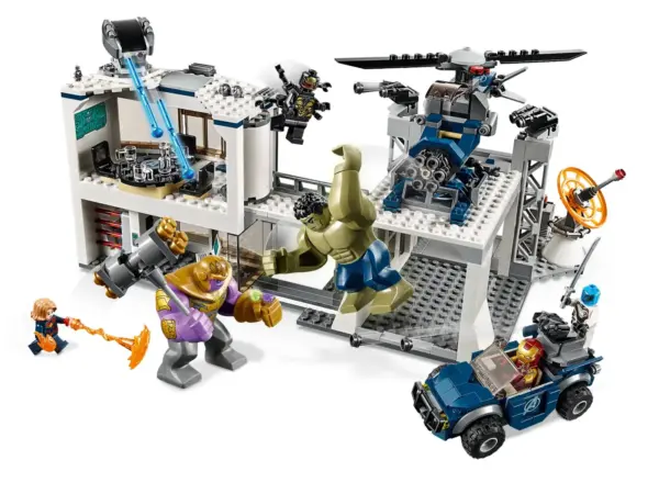 Stage a thrilling 76131 Avengers Compound Battle and defeat Thanos and the Outrider with this LEGO® Marvel Avengers toy building set! The Avengers headquarters features a 2-level office building with a meeting room—including a table with a secret gun compartment, an opening ‘laser-beam' safe, helipad, garage, rooftop spring-loaded shooter and dual stud shooters, plus a rotating, tilting radar. This popular toy construction set also includes a buildable toy helicopter with adjustable, spinning rotors and 6-stud rapid shooter, and an offroader with a rotating turret with dual stud shooter. Play out thrilling scenes from the Marvel Avengers movies with 4 minifigures, an Ant-Man microfigure and posable Hulk and Thanos big figures. This buildable superhero playset includes 4 Marvel Universe minifigures: Iron Man, Captain Marvel, Nebula and a 4-armed Outrider, plus posable Hulk and Thanos big figures and an Ant-Man microfigure. This construction toy features the Avengers compound with a 2-level office building, helipad, garage, plus a helicopter and offroader for creative play. The office building features: 2 Avengers ‘A' logo elements on the exterior wall; rotating, tilting spring-loaded shooter on the rooftop; lower level with an entrance, buildable rotating computer and a ‘laser-beam’ safe; and an upper level with a meeting room, table with secret compartment, rotating door leading to the helipad and accessory elements including 3 chairs, 2 guns, 3 cups and a jug. The compound also features: a helipad with 2 dual stud shooters and bridge to the office building; garage for the offroader with a ramp, opening barrier and a rotating, tilting radar dish; and tool racks with crowbar, wrench, welder and circular saw elements. Helicopter features an opening minifigure cockpit, 2 spinning, tilting rotors and a 6-stud rapid shooter. Offroader features a minifigure cockpit and rotating turret with dual stud shooter and standing room for a minifigure. Weapons include Nebula's sword and Thanos's buildable, double-sided battle axe. Accessory elements include Captain Marvel 10 Power Bursts for imaginative play. The Iron Man minifigure and Thanos and Hulk big figures are all new for March 2019, and the Nebula minifigure and Ant-Man microfigure each feature new-for-March-2019 Avengers team suit decoration. Recreate exciting scenes from the Marvel Avengers movies with this action-packed superhero toy building set for kids. Avengers compound measures over 6” (17cm) high, 11” (29cm) wide and 7” (20cm) deep. Helicopter measures over 3” (9cm) high, 5” (14cm) long and 1” (5cm) wide. Offroader measures over 2” (7cm) high, 4” (11cm) long and 2” (6cm) wide.