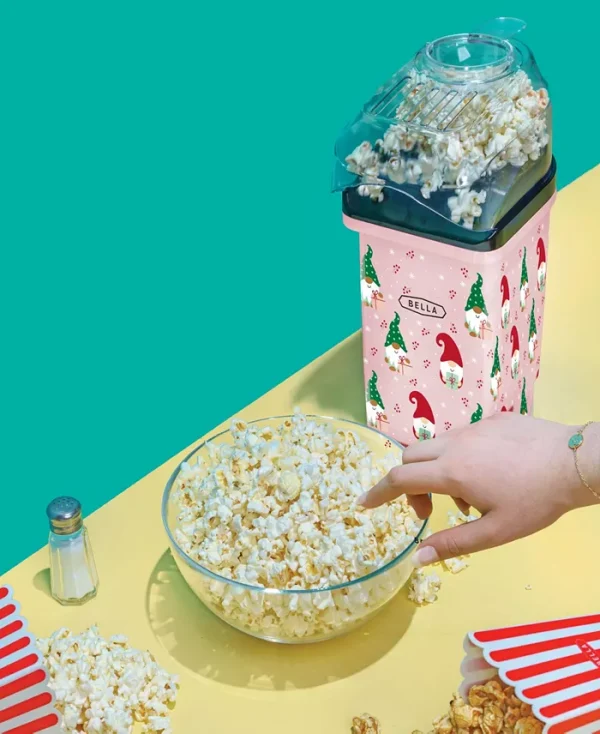 A healthy alternative to microwave popcorn (no oil needed!), this hot air popcorn maker by Bella is sure to make your next movie night a hit. Just push a single button and fresh popcorn is yours in less than 3 minutes. Conveniently use the lid-mounted scoop for measuring kernels and tray to melt butter during popping, too.