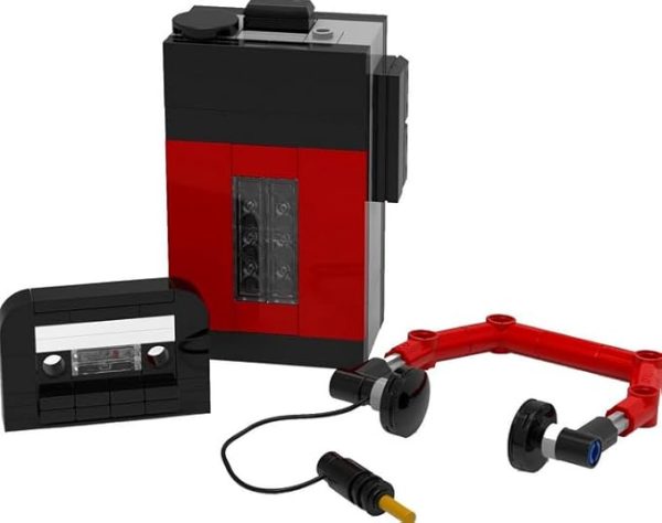 The LEGO® Retro Tape Player Building Set (6471612) is a nostalgic and fun set that brings back the classic charm of old-school music players. With intricate details that mimic the look of a vintage tape player, this set allows you to build a replica complete with a cassette tape and buttons for an authentic feel. The design features a retro color palette and functional elements, such as a tape that can be inserted and ejected. Perfect for LEGO enthusiasts and fans of vintage tech, this set combines creativity with a love for classic design, making it a unique and fun display piece or gift.