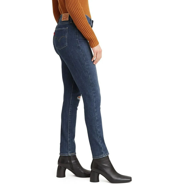 This five-pocket jean features a mid-rise and sleek skinny fit for a leg-lengthening silhouette. The front has a specially designed panel that holds you in for a tummy-slimming effect. Signature arcuate stitch highlights the back pockets. Belt loop waistband with brand patch at the back waist. Zip-fly and button closure.