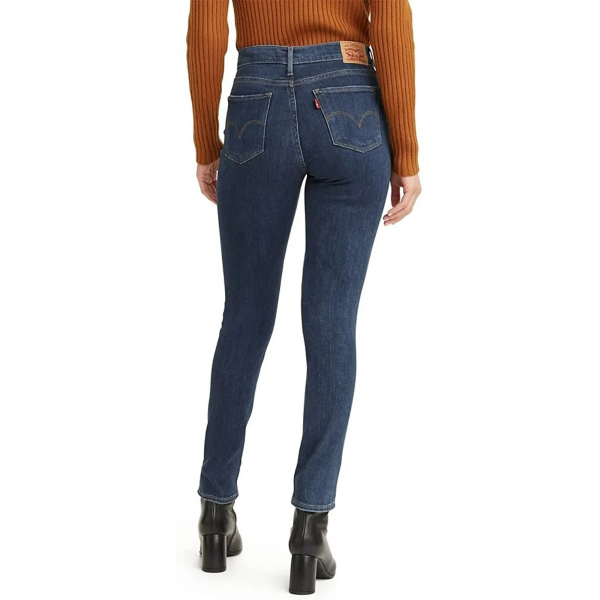 This five-pocket jean features a mid-rise and sleek skinny fit for a leg-lengthening silhouette. The front has a specially designed panel that holds you in for a tummy-slimming effect. Signature arcuate stitch highlights the back pockets. Belt loop waistband with brand patch at the back waist. Zip-fly and button closure.