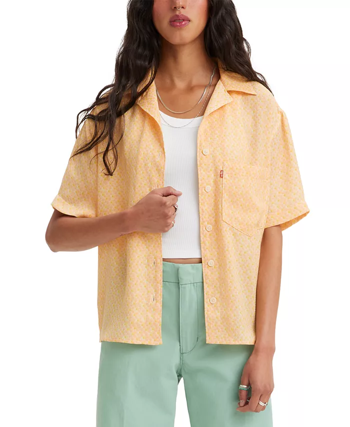 Levi's® kicks back with a relaxed short-sleeve camp shirt. The slightly oversized fit makes it perfect for layering. Patch pocket at chest Camp collar; front button closures Imported