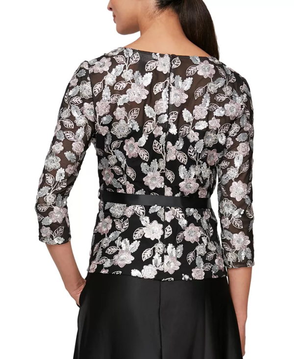 Sequins lend a glamorous finish to this embroidered blouse from Alex Evenings. 3/4-sleeves Scoop neckline Self-tie belt at waist Sequins may shed during wear Imported