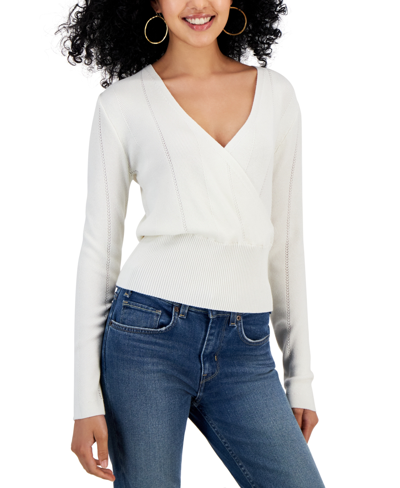 JUNIORS' SURPLICE-NECK RIBBED-HEM SWEATER IN BLIZZARD WHITE A dressed up sweater for the season, this Hippie Rose piece features a wide, fitted hem and romantic surplice neckline. Juniors Juniors' Clothing - Sweaters (new)