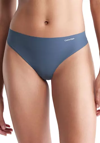 Ideal for your collection, this seamless, tag-free thong offers a smooth silhouette that's virtually invisible under clothes. This is a lingerie piece that every woman should own! Elevate your wardrobe with this closet staple. Product Details Tag-free Imported Material & Care elastane Hand wash
