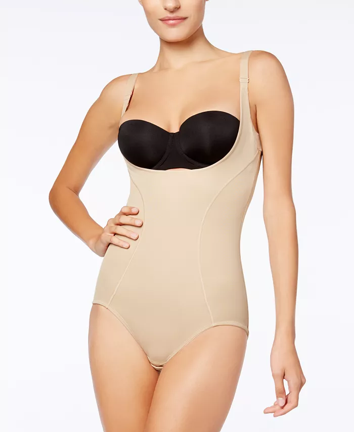 Ideal for body-hugging garments like cocktail dresses and gowns, Maidenform's Ultimate Instant Slimmer Open Bust Body Shaper helps smooth and shape your tummy, waist and back for a smooth, sexy looking appearance. The Wear Your Own Bra feature allows you to wear your favorite bra for any wearing occasion. Style #2656 Helps provide all-over smoothing and control Wear with your own bra to create the shape you desire Imported Row cut hems for ultimate no-show Soft, mesh-covered waistband Helps to smooth and shape tummy, waist and back Provides firm shaping and control Hook-and-eye closure at crotch Adjustable straps (Formerly known as "Flexees by Maidenform")