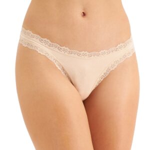 Indulge in comfort and sophistication with the Jenni Women's Lace-Trim Thong in Chai. This thong-style underwear combines luxurious lace detailing with a rich chai color, offering a perfect blend of style and comfort for your lingerie collection. Features: Chai Color: The rich chai hue adds a touch of elegance and warmth, making it a versatile and chic addition to your underwear drawer. Lace Trim: Delicate lace trim along the edges adds a feminine and romantic touch while ensuring a soft and gentle feel against the skin. Thong Cut: The thong design provides minimal coverage, perfect for wearing under fitted clothing to eliminate visible panty lines and achieve a seamless look. Soft Fabric: Crafted from a high-quality fabric blend, this thong offers a soft and comfortable feel against the skin, ensuring all-day comfort. Comfortable Waistband: The elastic waistband is designed for a secure and comfortable fit, allowing you to move freely throughout the day. Material: Body: 95% Cotton, 5% Spandex Lace: 88% Nylon, 12% Spandex Care Instructions: Machine wash cold with like colors Use only non-chlorine bleach when needed Tumble dry low Do not iron