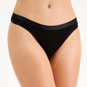 Discover the perfect combination of minimalism and elegance with the Jenni Women's Solid Thong in Classic Black. Designed to offer a seamless blend of style and comfort, this thong is an essential addition to your lingerie collection. Features: Classic Black: The timeless black color provides a sophisticated and versatile look, making it a must-have piece for any wardrobe. Thong Cut: The thong design offers minimal coverage, perfect for wearing under fitted clothing to eliminate visible panty lines and provide a smooth silhouette. Soft Fabric: Crafted from a high-quality cotton blend, this thong ensures a soft touch against the skin and excellent breathability, keeping you comfortable all day long. Comfortable Waistband: The elastic waistband is designed to stay in place without digging into the skin, providing a secure fit that moves with you. Lightweight Feel: The lightweight and stretchy fabric blend allows for ease of movement and a barely-there feel, ideal for everyday wear. Material: Body: 92% Cotton, 8% Spandex Care Instructions: Machine wash cold with like colors Use only non-chlorine bleach when needed Tumble dry low Do not iron