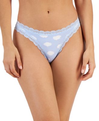 Embrace comfort and style with the Jenni Women's Lace-Trim Thong in a delightful Clouds pattern. Designed for the modern woman who values both elegance and ease, this thong offers a perfect blend of sophistication and everyday practicality. Features: Clouds Pattern: A whimsical cloud design adds a playful touch to your lingerie collection, bringing a bit of dreamy charm to your day. Lace Trim: Delicate lace detailing around the edges enhances the thong’s feminine appeal while providing a soft and gentle touch against your skin. Comfortable Fit: The thong is designed to offer a snug yet comfortable fit, ensuring it stays in place throughout the day without causing any discomfort. Breathable Fabric: Made from a high-quality, breathable fabric blend, this thong keeps you feeling fresh and confident all day long. Size L: Tailored to fit women who wear size L, offering ample coverage and a flattering silhouette. Material: Body: 90% Nylon, 10% Spandex Lace: 88% Nylon, 12% Spandex Care Instructions: Machine wash cold with like colors Use only non-chlorine bleach when needed Tumble dry low Do not iron