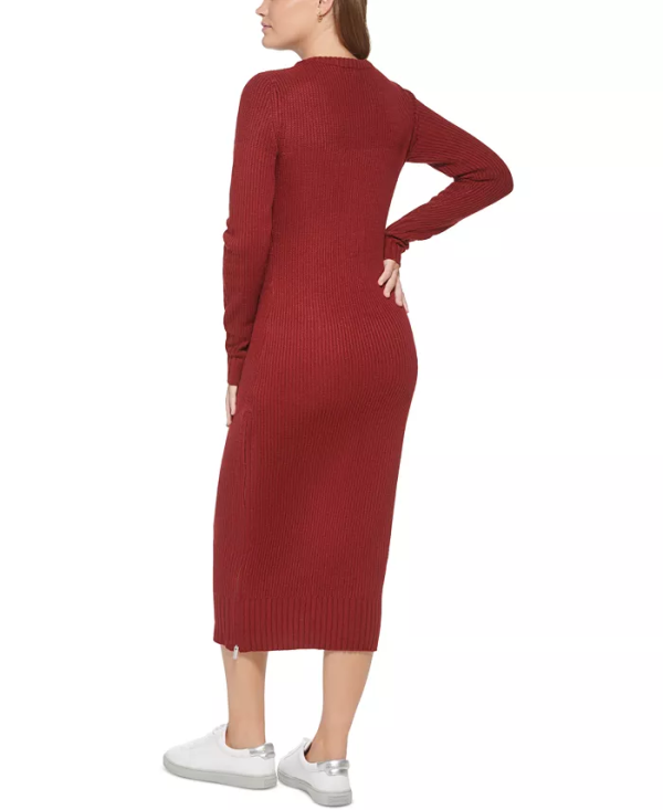 Rock a sleek look with this ultra-chic crewneck dress from Calvin Klein Jeans finished with stylish, zippered side slits. Acrylic Approx. 44-½" long from center back to hem Long sleeves Zipper closure on side slit Crewneck Side slit Imported