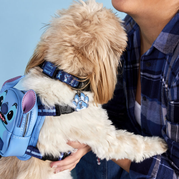 Every member of your ohana deserves to step out in style! The Loungefly Disney Lilo & Stitch Dog Collar features an adjustable nylon strap, with Disney Stitch and Scrump playing side by side. The signature Loungefly plaque accompanies a crown on the collar’s buckle, and an enamel pawprint charm appears on the leash hook. Whether you’re hanging at the beach or taking off on an other-worldly adventure, this accessory is perfect for your little troublemaker. The Loungefly Disney Lilo & Stitch Dog Collar is made with durable nylon material and features printed details. Collar adjusts for safety/fit and includes sturdy metal hardware. This collar is an officially licensed Disney product. Collar dimensions: (Small) 0.5”W, Neck: 9”-13”; (Medium) 0.75”W, Neck: 13”-20”; (Large) 1”W, Neck: 18”-29”