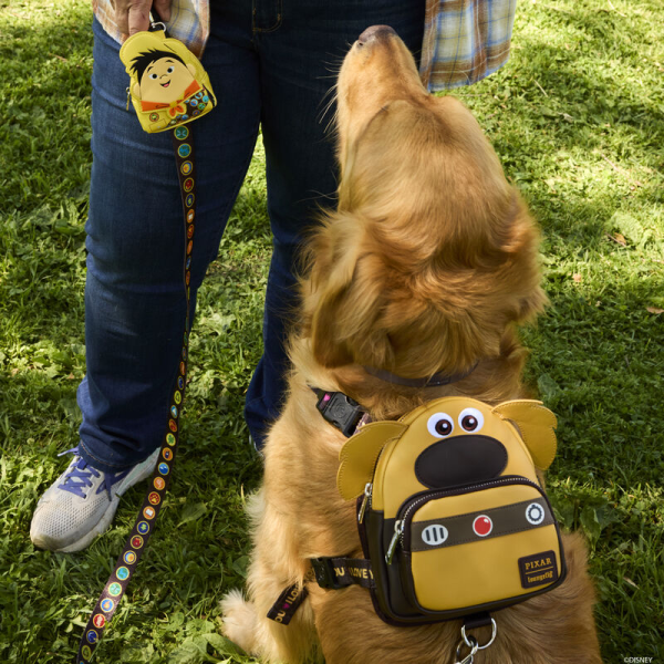 We have just met him, and we love him! Give your best friend a stylish new look with the Loungefly Disney-Pixar Up 15th Anniversary Dug Cosplay Mini Backpack Harness. On the front of the backpack, Dug takes shape with floppy ears and a big round nose. His communication collar appears on the zipper pocket below, where a sturdy ring can attach to a leash. Dug’s signature catchphrase appears on the adjustable harness straps, which connect to a comfortable mesh padding lined with metallic details. With plenty of room for storing essentials, this harness will keep your pet prepared for their next big adventure. The Loungefly Disney-Pixar Up 15th Anniversary Dug Cosplay Mini Backpack is made with durable vegan leather (polyurethane). Harness has adjustable nylon straps and shiny silver hardware. Additional features include applique and debossed details. Take note of the coordinating inside lining. This harness is an officially licensed Disney-Pixar product.