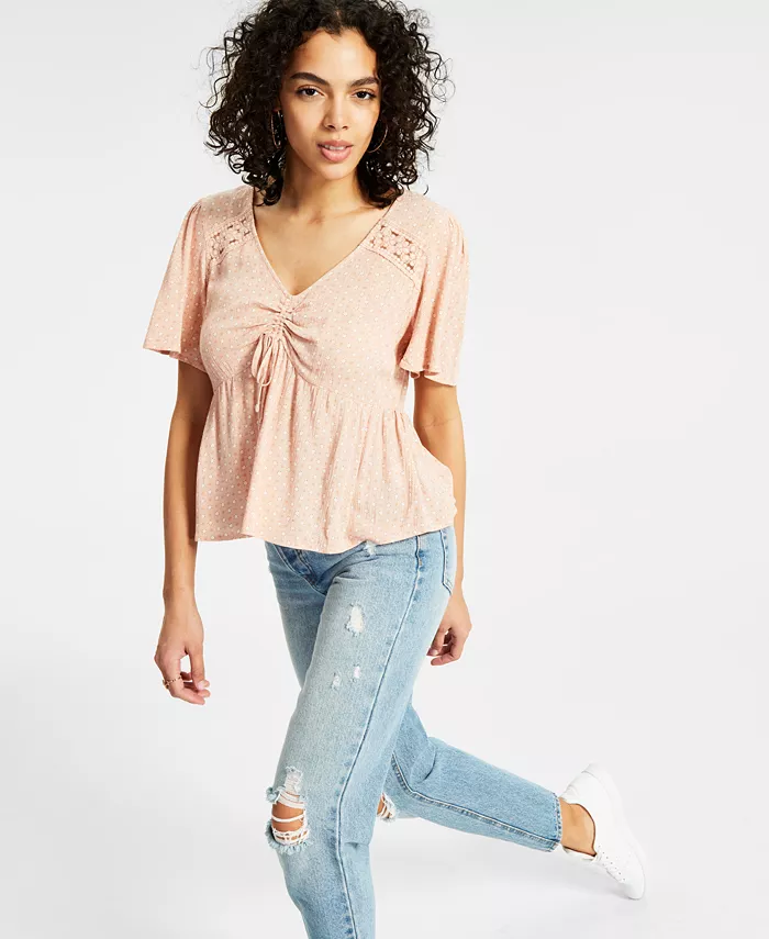 For easy, breezy days, pair this flowy Hippie Rose top with your fave distressed denim for a chic boho vibe. Approx. model height is 5'10" and she is wearing a size medium Relaxed fit V-neck Front ruching and tie; crocheted details Juniors’ sizes run smaller than women’s sizes. Size up for the perfect women’s fit. See size chart. Rayon; trim: cotton Machine washable Imported
