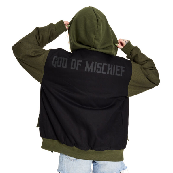 Slip away with a timeless look. The Loungefly COLLECTIV Marvel Loki The WEEKENDR Hooded Jacket offers an elevated way to show off your fandom on any timeline. This heavy-duty jacket features a drawstring hood and elevated gold magnet rivet details of Loki’s helmet symbol on the side pockets. Mixed fabrics, such as a chenille patch of Loki’s symbol in green, against a contrast of darker fabric, will take you from day to night effortlessly. The green color, on the sleeves, creates a background for an elegant pattern of Loki’s snake symbol to take shape. On the back, a matte high-density screen print adds subtle dimension to the “God of Mischief” text. The Loungefly COLLECTIV Marvel Loki The WEEKENDR Hoodie is made of 100% polyester for the canvas outer shell and lining. The jersey-lined hood is 60% cotton and 40% polyester. Additional features include a drawstring hood, gold magnet rivet details, a chenille patch, and printed details. This hoodie is an officially licensed Marvel product. Comes in unisex sizes S through 3X. Sizing is very specific.