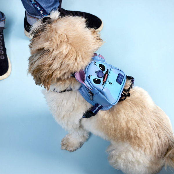 Every member of your ohana deserves to step out in style! The Loungefly Disney Lilo & Stitch Cosplay Dog Harness takes our iconic mini backpack design and gives it a pet-friendly makeover. On the front, Disney’s Stitch takes shape with applique ears and embroidered facial features. Zippered pockets and a bag dispenser give space to carry any essentials, and adjustable nylon straps ensure a safe and comfortable fit while a leash hook appears on the back of the harness. Whether you’re hanging at the beach or taking off on an other-worldly adventure, this accessory is perfect for your little troublemaker. The Loungefly Disney Lilo & Stitch Cosplay Dog Harness is made with durable vegan leather (polyurethane) and features applique, embroidered, and printed details. Harness has adjustable nylon straps and sturdy metal hardware. Take note of the coordinating inside lining. This harness is an officially licensed Disney product. Harness Dimensions: (Small) Neck: 9”-16” X Chest: 12”-20”; (Medium) Neck: 10”-20” X Chest: 14”-33”; (Large) Neck: 13”-25” X Chest: 23”-45”