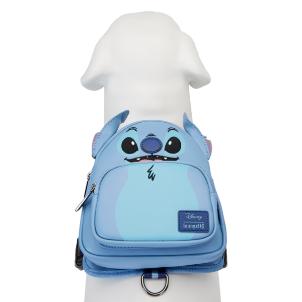 Every member of your ohana deserves to step out in style! The Loungefly Disney Lilo & Stitch Cosplay Dog Harness takes our iconic mini backpack design and gives it a pet-friendly makeover. On the front, Disney’s Stitch takes shape with applique ears and embroidered facial features. Zippered pockets and a bag dispenser give space to carry any essentials, and adjustable nylon straps ensure a safe and comfortable fit while a leash hook appears on the back of the harness. Whether you’re hanging at the beach or taking off on an other-worldly adventure, this accessory is perfect for your little troublemaker. The Loungefly Disney Lilo & Stitch Cosplay Dog Harness is made with durable vegan leather (polyurethane) and features applique, embroidered, and printed details. Harness has adjustable nylon straps and sturdy metal hardware. Take note of the coordinating inside lining. This harness is an officially licensed Disney product. Harness Dimensions: (Small) Neck: 9”-16” X Chest: 12”-20”; (Medium) Neck: 10”-20” X Chest: 14”-33”; (Large) Neck: 13”-25” X Chest: 23”-45”