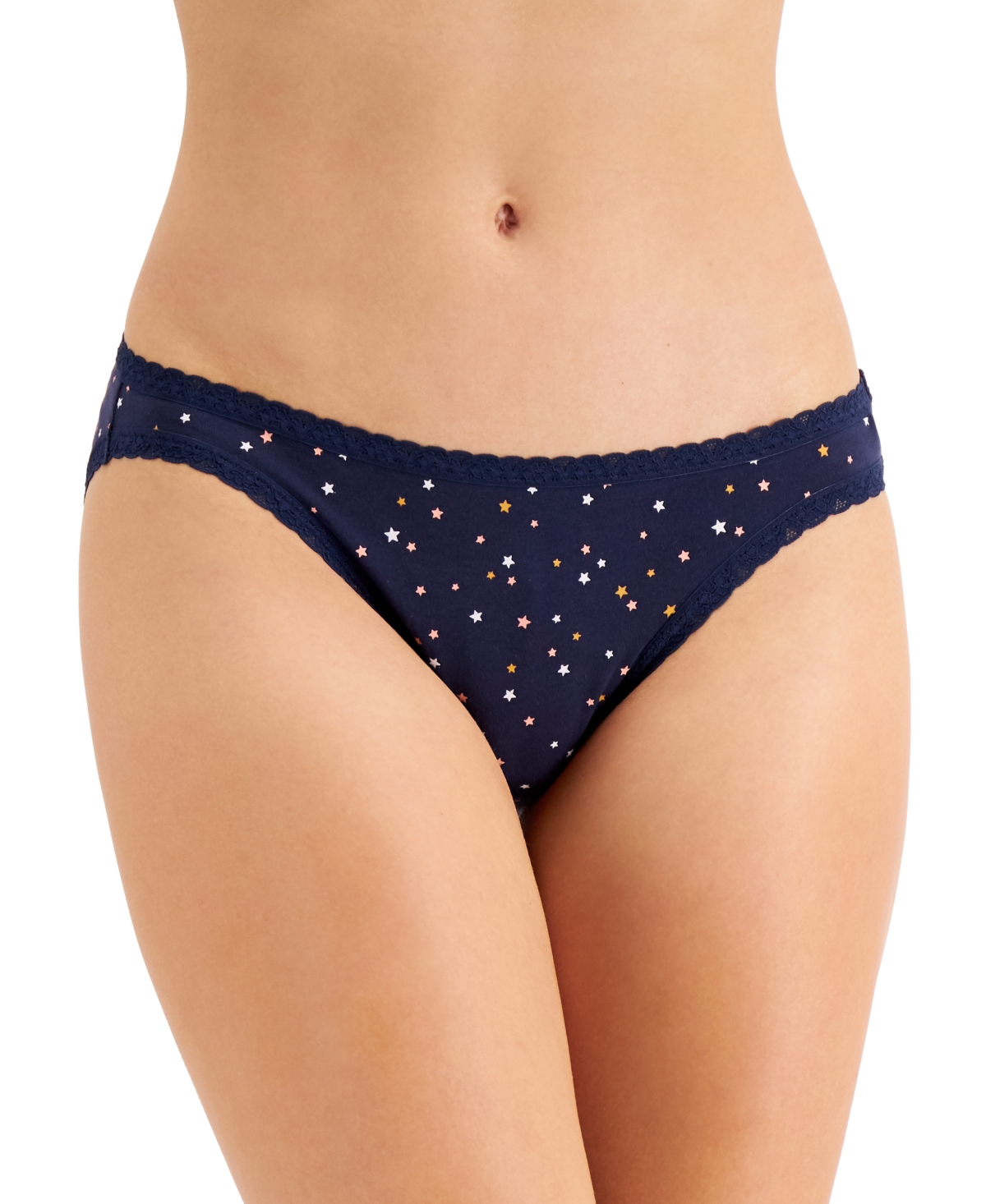 Set sail into comfort and style with the Jenni Women's Lace-Trim Thong in Navy Sail. This thong-style underwear combines a classic navy blue hue with delicate lace accents, offering a perfect blend of sophistication and allure for your lingerie collection. Features: Navy Sail Color: The deep navy blue hue evokes a sense of nautical charm and elegance, making it a versatile and timeless addition to your underwear drawer. Lace Trim: Delicate lace trim along the edges adds a feminine and romantic touch while ensuring a soft and gentle feel against the skin. Thong Cut: The thong design provides minimal coverage, perfect for wearing under fitted clothing to eliminate visible panty lines and achieve a seamless look. Soft Fabric: Crafted from a high-quality fabric blend, this thong offers a soft and comfortable feel against the skin, ensuring all-day comfort. Comfortable Waistband: The elastic waistband is designed for a secure and comfortable fit, allowing you to move freely throughout the day. Material: Body: 95% Cotton, 5% Spandex Lace: 88% Nylon, 12% Spandex Care Instructions: Machine wash cold with like colors Use only non-chlorine bleach when needed Tumble dry low Do not iron