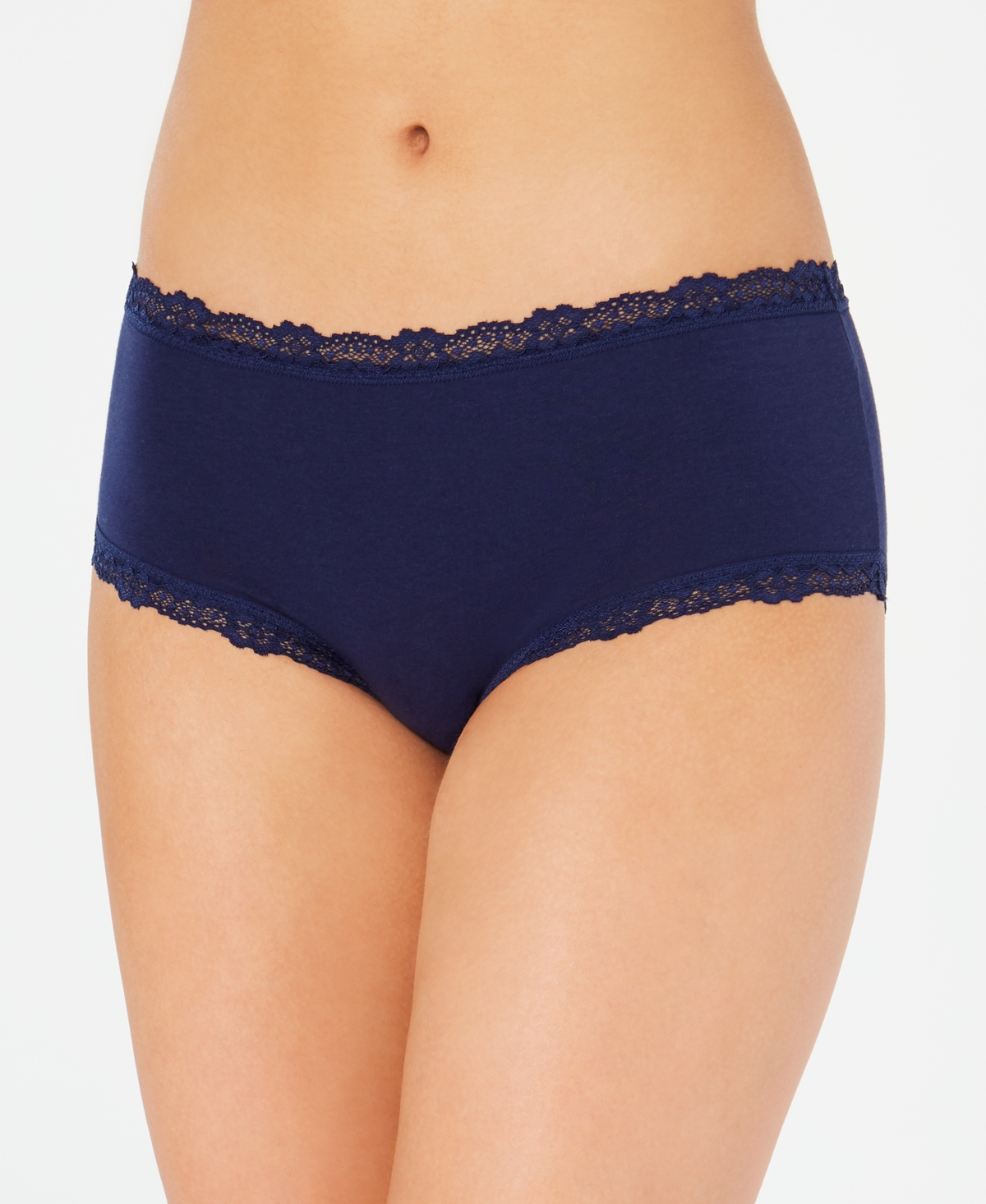 Embrace a perfect blend of comfort and sophistication with the Jenni Cotton Lace Trim Hipster in Navy Sea. This hipster-style underwear offers a flattering fit and elegant design, making it an essential addition to your lingerie collection. Features: Navy Sea: The rich navy sea color exudes a sense of elegance and calm, making it a versatile and stylish choice for any wardrobe. Lace Trim: Delicate lace trim along the edges adds a touch of femininity and charm while ensuring a soft, non-irritating feel against the skin. Hipster Cut: The hipster cut provides moderate coverage with a low-rise fit, ensuring it sits comfortably on the hips and offers a flattering silhouette. Soft Cotton Fabric: Made from high-quality cotton, this hipster ensures breathability and all-day comfort, perfect for everyday wear. Comfortable Waistband: The elastic waistband is designed for a secure and comfortable fit, allowing for ease of movement and staying in place throughout the day. Material: Body: 95% Cotton, 5% Spandex Lace: 88% Nylon, 12% Spandex Care Instructions: Machine wash cold with similar colors Use only non-chlorine bleach when needed Tumble dry low Do not iron