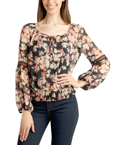 JUNIORS' FLORAL-PRINT SMOCKED PEASANT TOP IN PAT A Score a trending look with this floral-print peasant top from Bcx.