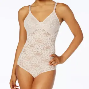 Say hello to the smoothing and slimming control of our Bali® Lace 'N Smooth Bodybriefer. Soft and breathable stretch lace fabric provides firm control as it shapes and smooths your tummy, waist and derriere. Support Level: Firm control and shaping Imported Coverage: Full coverage; smoothing lace delivers breathable comfort Straps: Front adjustable straps Tech Features: All over solution Cups: Softly-lined seamless cups for added support & coverage