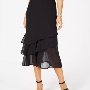 When paired with a sparkly shoe and a shimmery top, the sheer tiers of this Alex Evenings skirt will make you feel like the belle of the ball. Elastic waistband; no closure Made in USA Lined Tiered silhouette