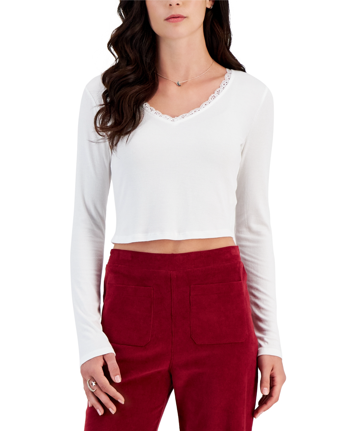 JUNIORS' LACE-TRIMMED V-NECK RIBBED TOP IN SNOW WHITE Self Esteem goes cropped and cozy for trend-right style this season with this lace-trimmed top. Juniors Juniors' Clothing - Tops